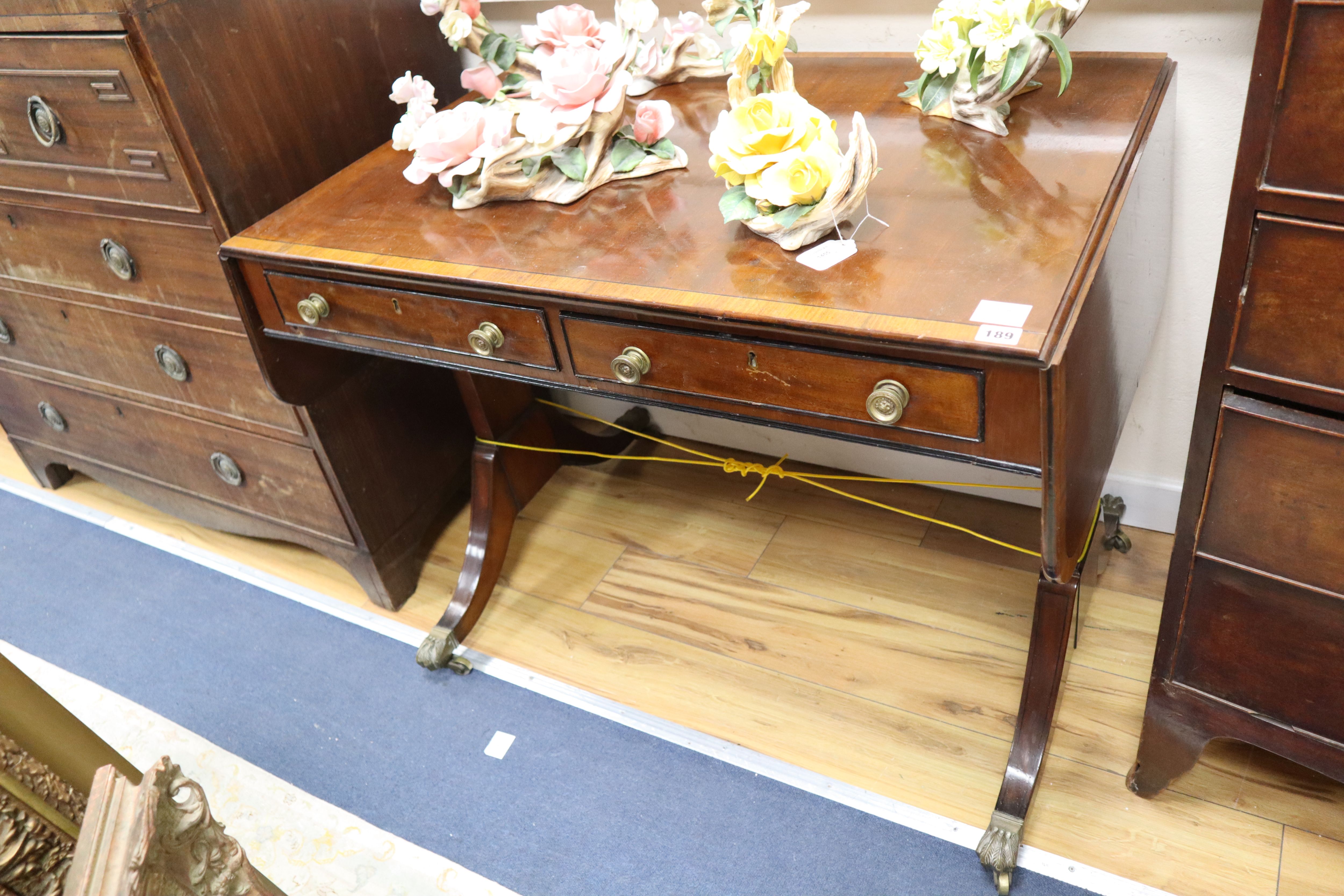 A Regency satinwood banded mahogany sofa table, W.3ft 1in. D.2ft 6in. H.2ft 6in.